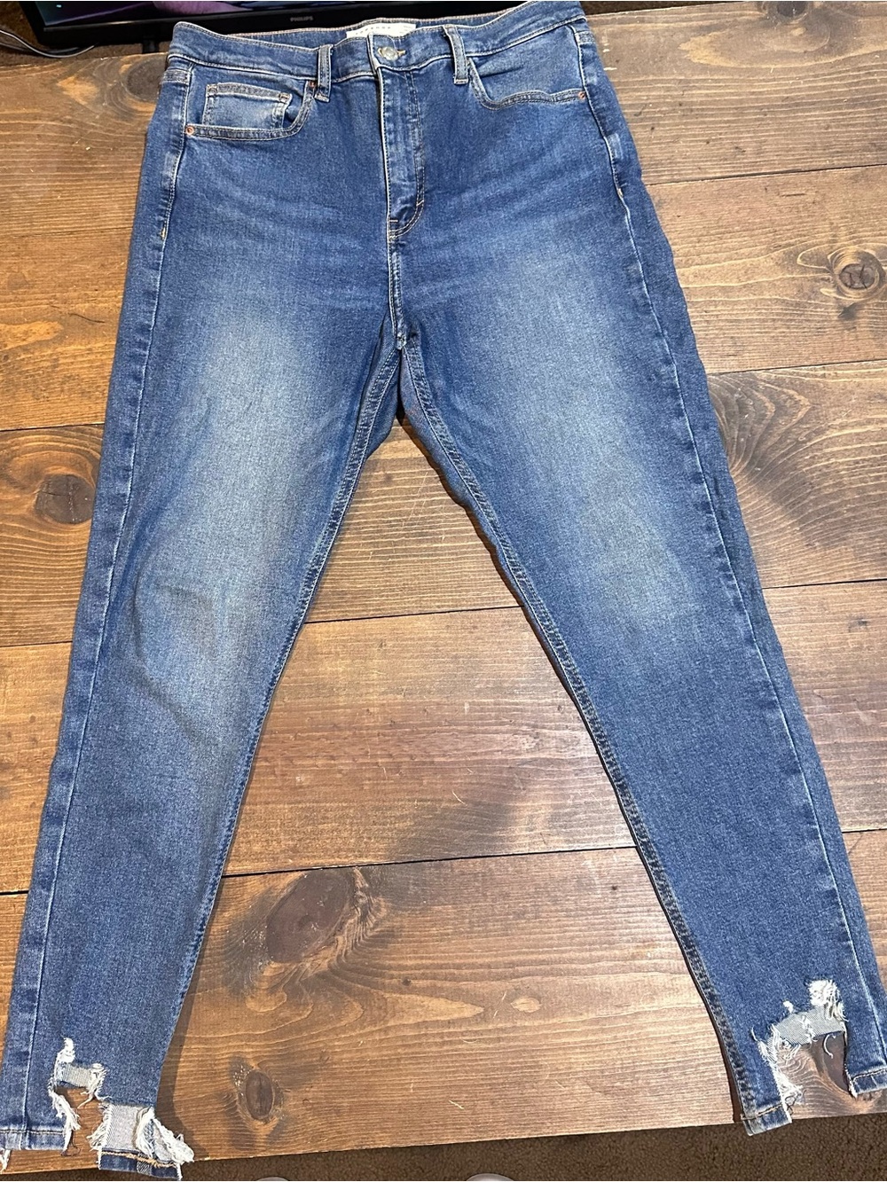 Topshop High Rise Skinny Jeans in Medium Blue with Distressed Ankles